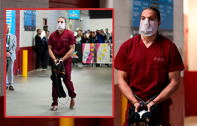 El receptor acaparó la atención antes del Super Bowl al llegar al Levi’s Stadium esposado, descalzo y enmascarado.