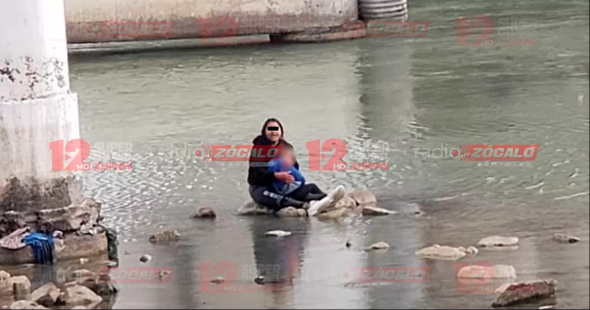 El menor fue rescatado con hipotermia y el padre no ha sido localizado. La familia intentó cruzar por el río a Estados Unidos pese a lo helado de las aguas del Bravo.