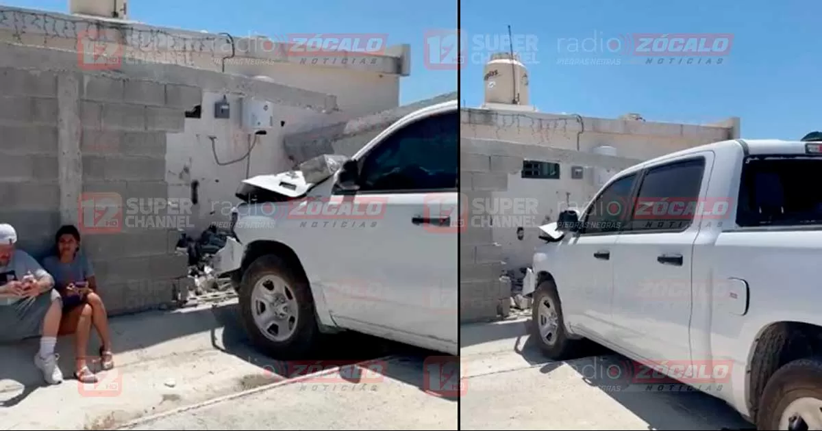 Provoca texano daños de 200 mil tras chocar contra un camión y tumbar una barda