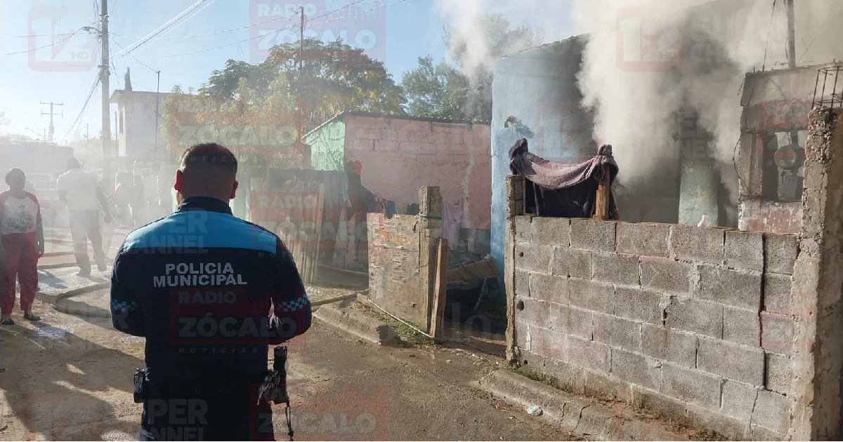 Veladora provoca incendio en vivienda de Las Américas